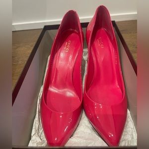 Coral pink Gucci patent heels